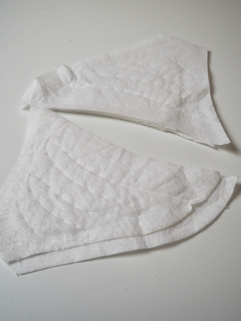 Small Shaped White Shoulder Pads